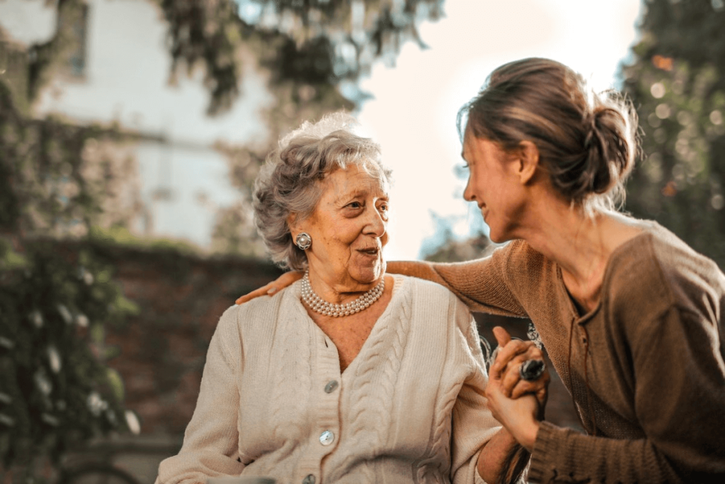 two-women-talking-with-a-smile