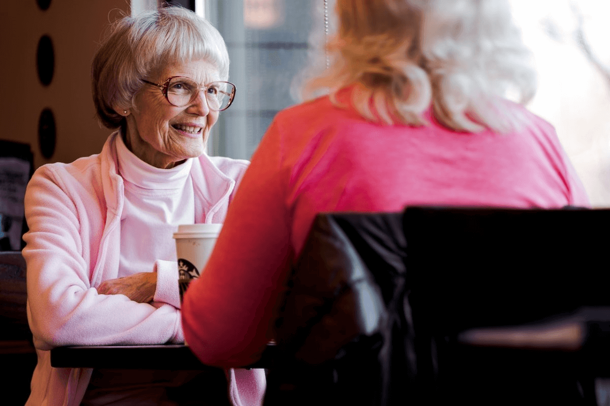 two-elderly-women-having-a-conversation